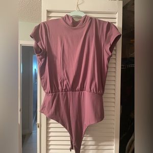 Susana Monaco NWOT body suit in purple.